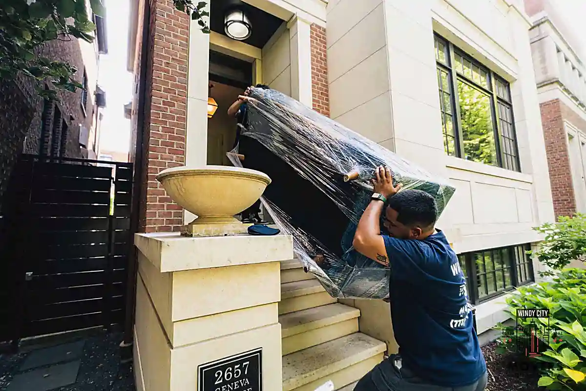 Windy City Movers crew wrapping furniture